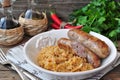 Juicy Roasted Bavarian sausages with the stewed cabbage