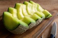 Juicy slice melon on a wooden table Royalty Free Stock Photo