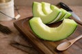 Juicy slice melon on a wooden table