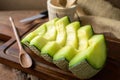 Juicy slice melon on a wooden table Royalty Free Stock Photo