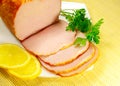 Juicy sliced carbonate with parsley and lemon Royalty Free Stock Photo