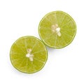 Juicy slices of lime isolated on white.