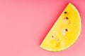 Juicy slices of yellow watermelon on a bright pink background. Conceptual colors of summer. Patterns top view as a background or Royalty Free Stock Photo