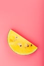 Juicy slices of yellow watermelon on a bright pink background. Conceptual colors of summer. Patterns top view as a background or Royalty Free Stock Photo