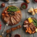 Juicy steak cooked on a grill with grilled vegetables