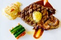 Juicy steak medium rare beef with mashed potato and vegetable with sauce. Top view, close up Royalty Free Stock Photo