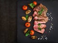 Juicy steak medium rare beef with spices Royalty Free Stock Photo