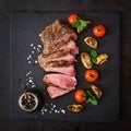 Juicy steak medium rare beef with spices Royalty Free Stock Photo