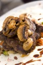 Juicy steak with mushrooms Royalty Free Stock Photo