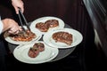 Juicy Steak served by chef Royalty Free Stock Photo