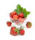Juicy strawberries in a glass bowl isolated on white background Royalty Free Stock Photo
