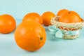 Juicy tangerines in wicker basket,