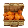 Juicy tangerines in the wicker box over white Royalty Free Stock Photo