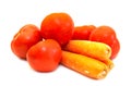 Juicy tomatoes with carrot close-up