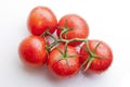 Juicy tomatoes on white background