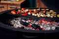 Juicy vegetables and meat grilling. beef steak mushrooms corn pe Royalty Free Stock Photo