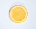 Juicy yellow slice of lemon full of vitamins on a white isolated background