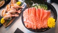 Juicy yummy tasty delicious freshness traditional Japanese style food raw seafood sliced salmon fish sashimi on ice in bowl Royalty Free Stock Photo