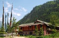 Tibetan-style buildings and prayer flags in Juizhaigou Nine Villages Valley, Sichuan, China Royalty Free Stock Photo