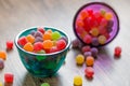 Jujube colored balls in a colorful glass bowl on a table Royalty Free Stock Photo