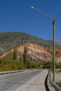jujuy purmamarca asphalt street in the background hill seven colors and blue sky argentina-fito rg