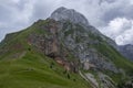 Julian Alps mountain Mangart from Mangrt saddle, Slovenia\'s Highest Panoramic Road, foggy weather