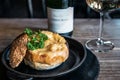 Julienne in a bun with wine Royalty Free Stock Photo