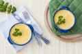 Julienne with mushrooms and cream. Mushroom and cheese gratin in ceramic bowls, on wooden background Royalty Free Stock Photo