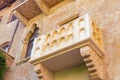 Juliet balcony house in Verona, Italy. Summer time. Royalty Free Stock Photo