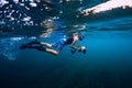 July 30, 2019. Anapa, Russia. Underwater photographer with camera swim in sea