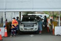 Drivers wait to get tested for Covid-19 at coronavirus drive through testing site in Melbourne