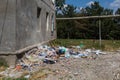 July 24, 2020 Balti Moldova. Huge garbage dump near residential building. Scattered household and construction waste