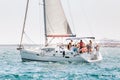 Tourists rent luxury sailing yacht for adventure in the sea