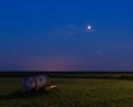 The July 2018 Bloodmoon lunar eclipse seen above a meadow on Schiermonnikoog