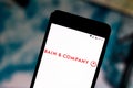 July 10, 2019, Brazil. In this photo illustration the Bain & Company logo is displayed on a smartphone Royalty Free Stock Photo