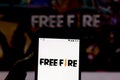 July 25, 2019, Brazil. In this photo illustration the Garena Free Fire logo is displayed on a smartphone