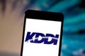 July 1, 2019, Brazil. In this photo illustration the KDDI Corporation logo is displayed on a smartphone