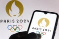 July 5, 2021, Brazil. In this photo illustration Paris 2024 Olympic Games 2024 Summer Olympics logo is seen on a smartphone