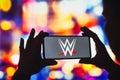 July 29, 2022, Brazil. In this photo illustration, the World Wrestling Entertainment WWE logo is displayed on a smartphone