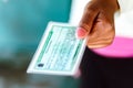 July 4, 2020, Brazil. Woman holds the Voter License TÃÂ­tulo Eleitoral. It is a document that proves that the person is able to