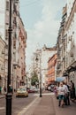 Narrow vintage city street. Historic architecture