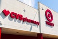 July 30, 2018 Cupertino / CA / USA - Close up of CVS Pharmacy logo displayed alongside the Target Bullseye symbol; CVS Health