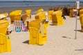 Yellow beach chairs on a sandy beach