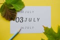 3 july day of month on a white sheet and the dates of the day earlier and later, written in simple pencil. Decoration