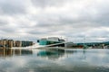 July 26, 2013. Day view of the Opera house and promenade in Oslo, Norway. The national Opera and ballet theatre is located on the Royalty Free Stock Photo