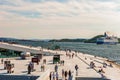 July 26, 2013. Day view of the Opera house and promenade in Oslo, Norway. Tourists enjoy the view of the fjord Royalty Free Stock Photo