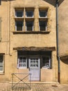 July 18, 2017 France city of Cluny, region of the Burgundy: Old narrow street of the central part of the city in hot, sunny summer