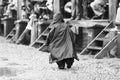 11 JULY 2013 - GARANA, ROMANIA. Scenes and people sitting or walking on the street in a rainy day Royalty Free Stock Photo