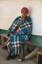 04 July, 2015 - Lesedi, South Africa. Woman Bantu Sesotho next to her house.