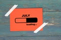 July loading on paper Royalty Free Stock Photo